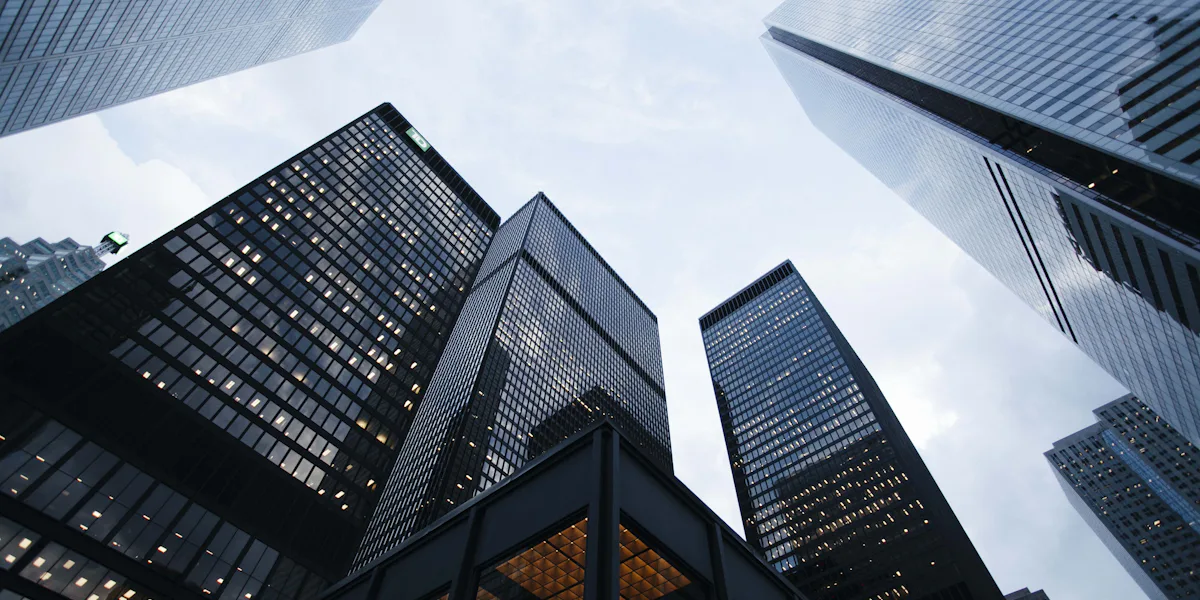 Glass towers of a financial district seen from below
